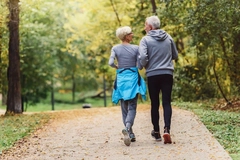 Image elderly couple out for a jog