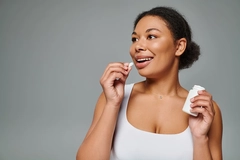 Woman taking supplements Woman taking supplements