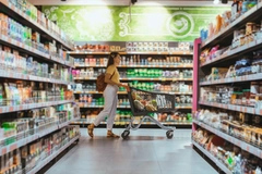 Woman shops in supermarket