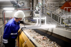 Image man looking at recycling