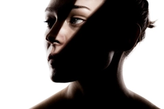 Image Woman with a shadow across her face