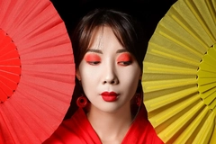 Image Japanese woman with fans in front of her face