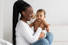 Image mother holding her baby