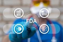 Image A scientist clicking FDA.