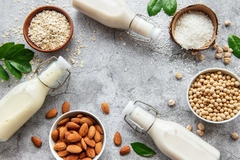 Image Plant-based dairy beverages, chickpeas, coconut, almonds and oats.