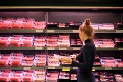 Image Woman buying meat in the supermarket