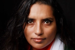 Image Indian woman looks into the camera